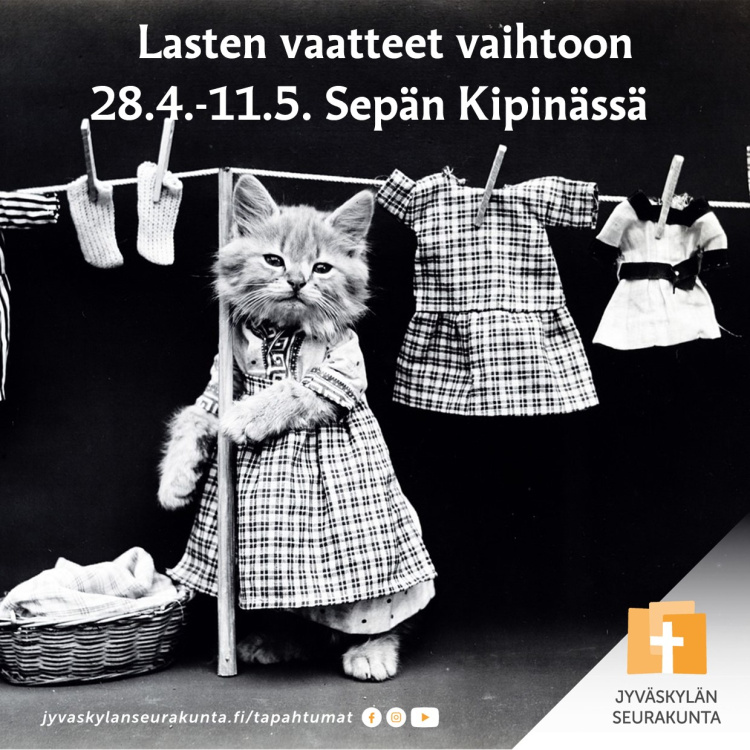 Lasten vaatteet vaihtoon Kissa ripustaa vaatteita narulle